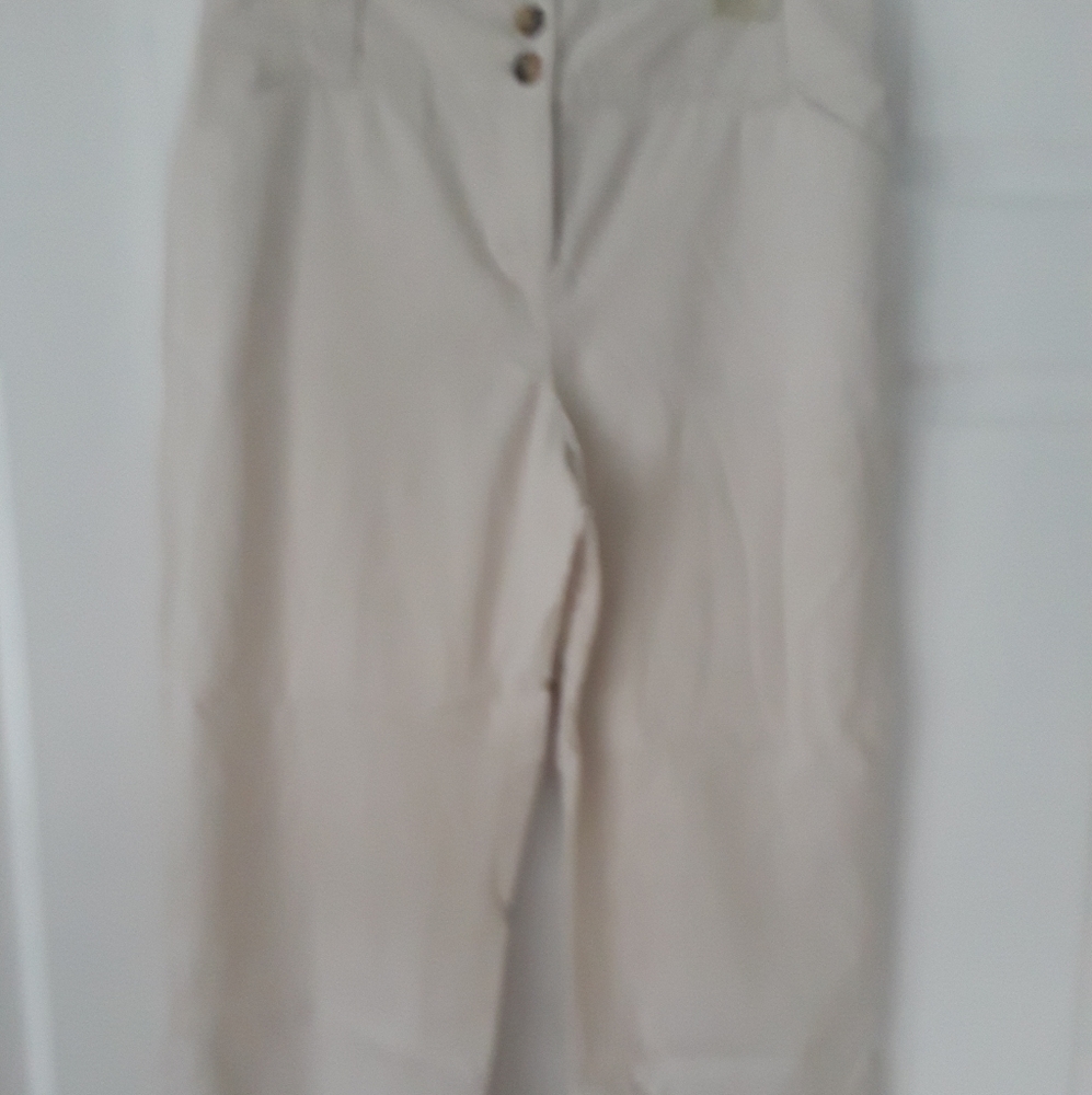 Cream colored crop pants.